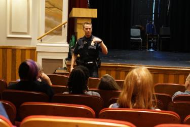 A CUPD officer teaches an active harmer response class