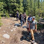 Faculty, students and technicians from CU Boulder and the University of Wyoming walk the site of the newly installed EcoTram near INSTAAR’s Mountain Research Station.