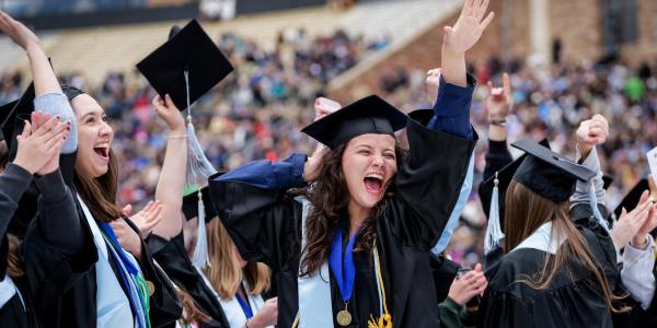 Graduates celebrate after the commencement ceremony