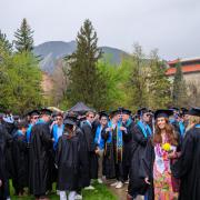Graduates gathered on Norlin Quad before the commencement procession