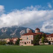 Leeds School of Business building with Flatirons in the background