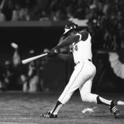Hank Aaron swinging bat at the plate