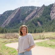 Emily King Kinsey in front of Boulder Flatirons