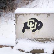 CU Buffs logo on a snow covered sign